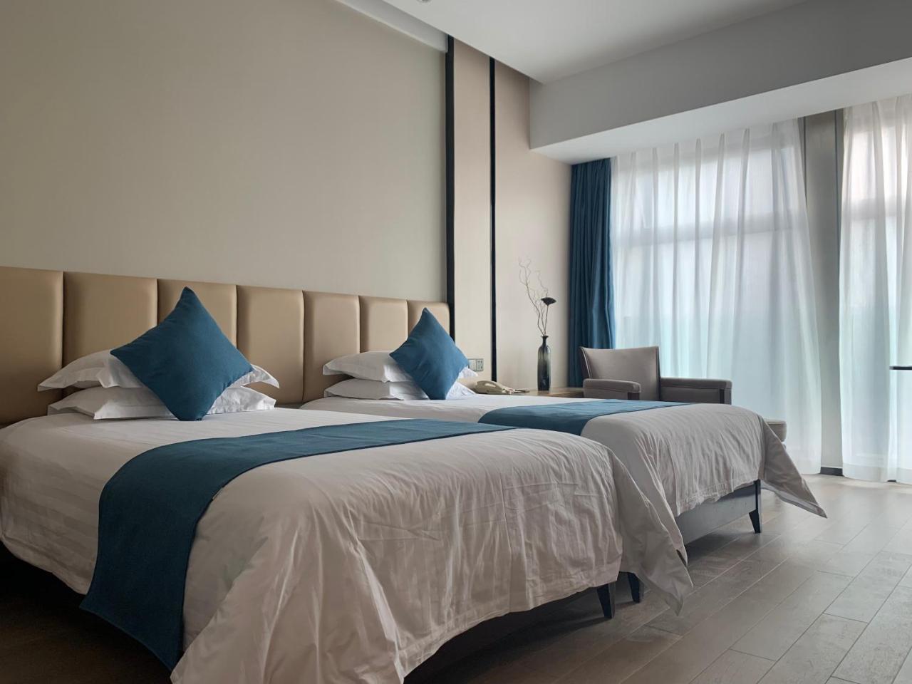 Jinchang New Century Hotel Shaoxing Keqiao Bagian luar foto